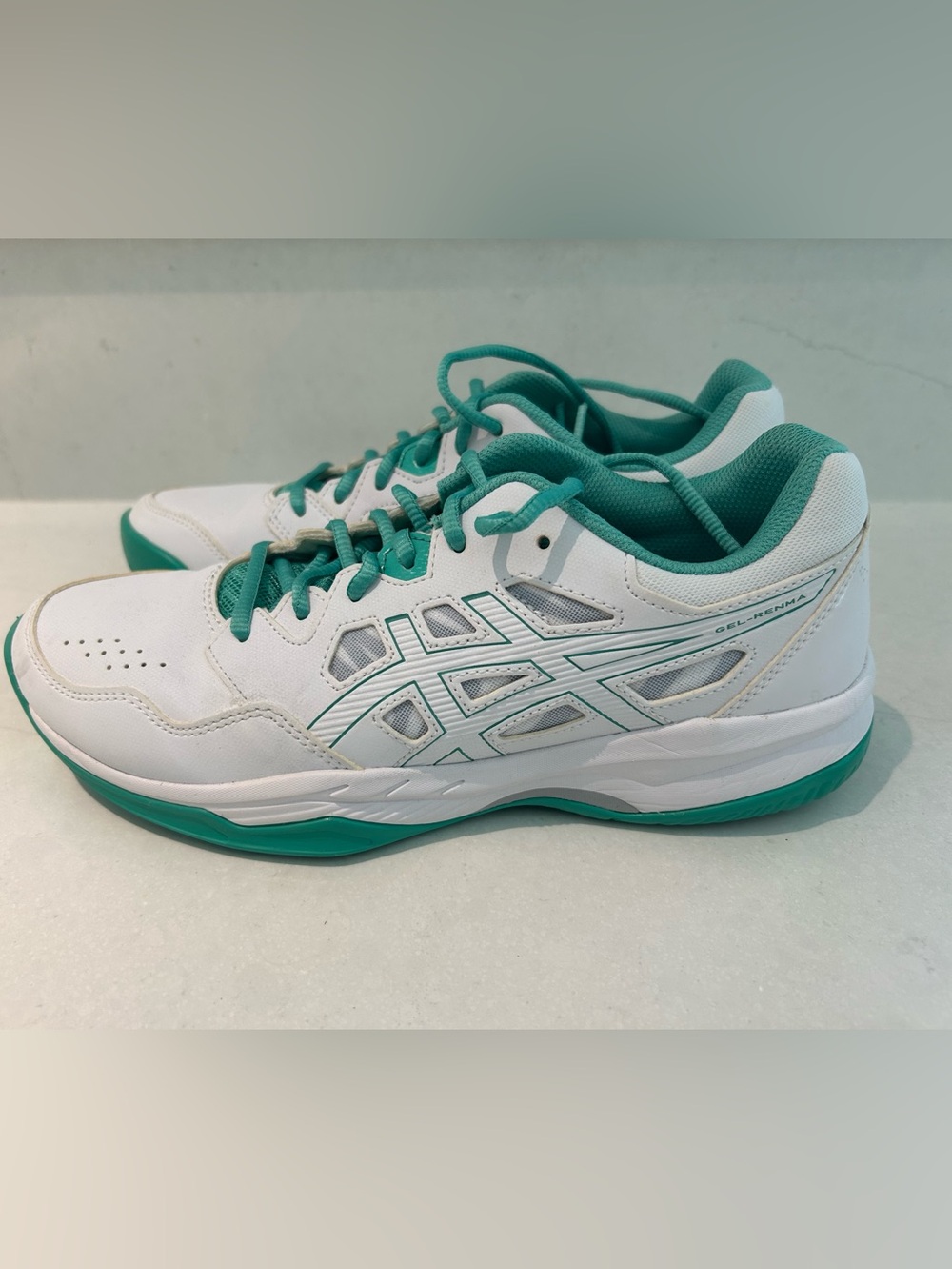 ASICS women’s size 9 court shoes